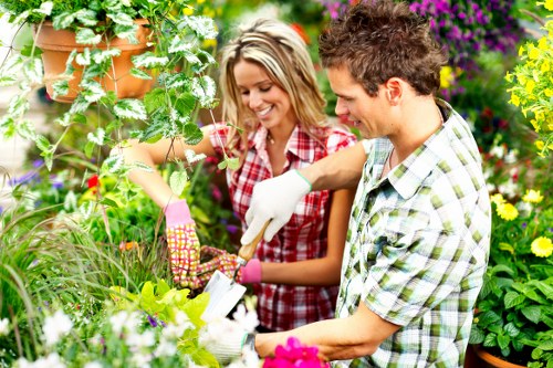 Happy homeowner enjoying their Hackney garden